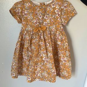 Baby girl 12 month floral dress. Diaper cover still attached.new without tags
